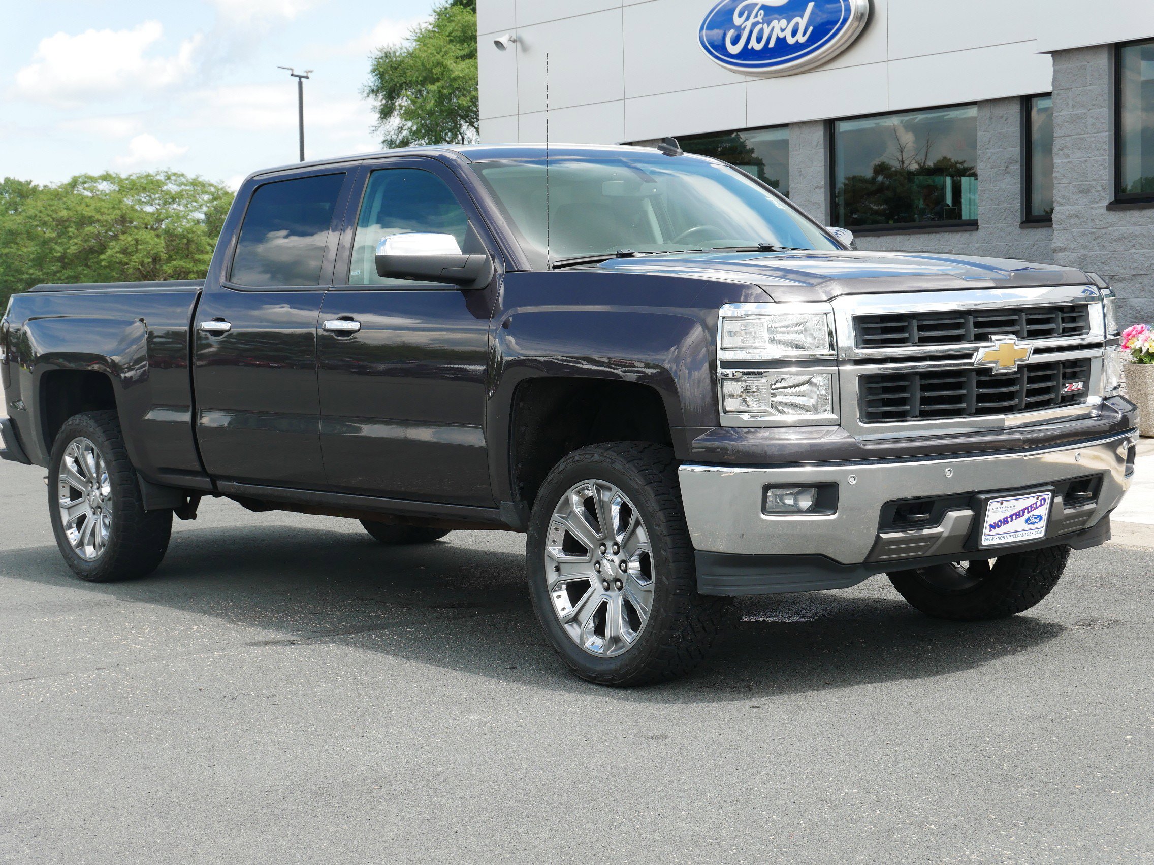 Used 2014 Chevrolet Silverado 1500 LTZ with VIN 3GCUKSEC9EG403049 for sale in Northfield, Minnesota