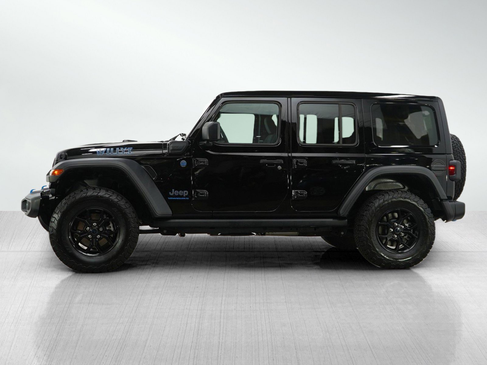 Used 2024 Jeep Wrangler 4xe Willys 4XE with VIN 1C4RJXN6XRW166045 for sale in Hopkins, Minnesota