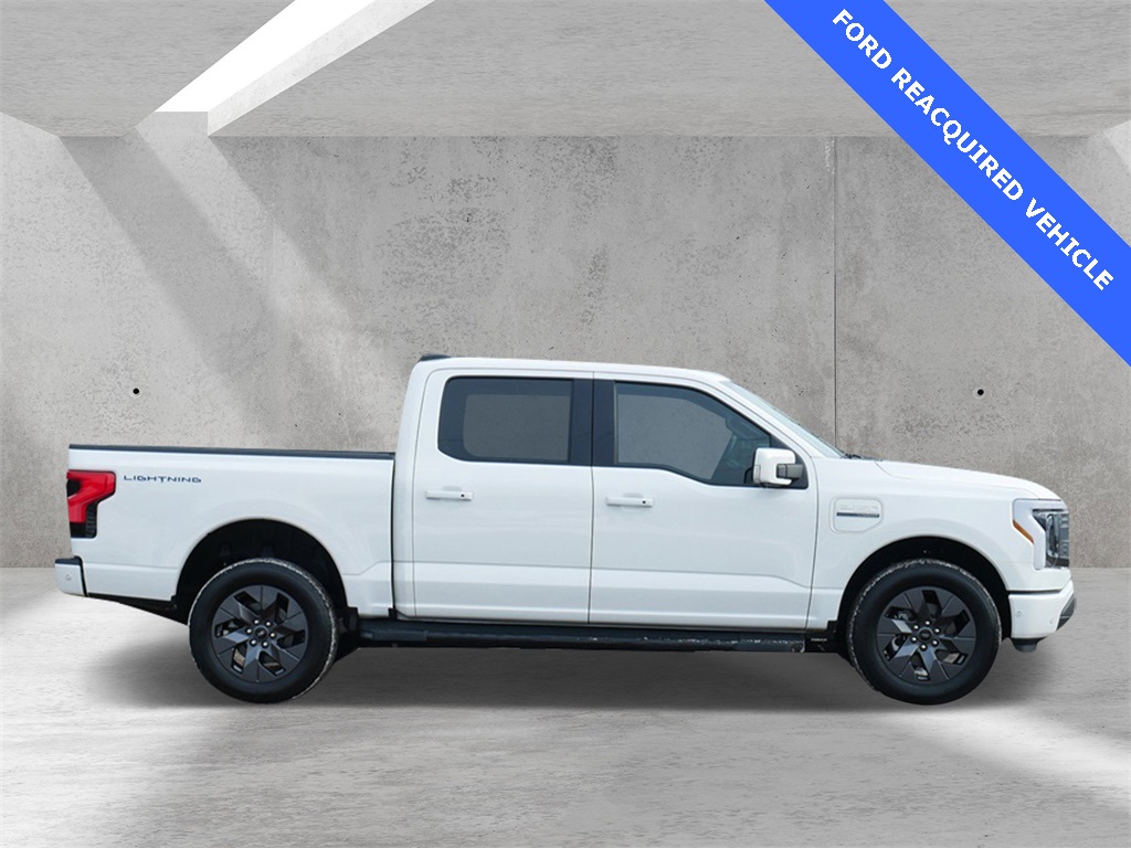 Used 2023 Ford F-150 Lightning Lariat with VIN 1FT6W1EV5PWG05285 for sale in White Bear Lake, MN