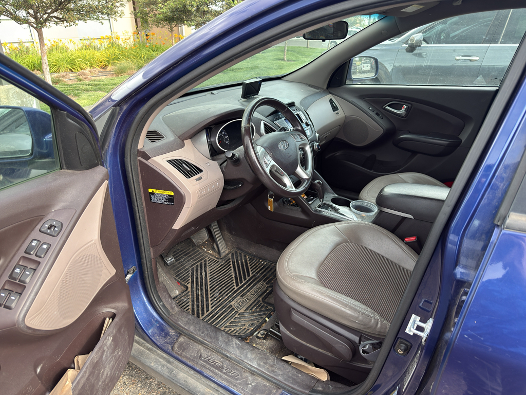 Used 2013 Hyundai Tucson GLS with VIN KM8JUCAC2DU604887 for sale in Santa Fe, NM