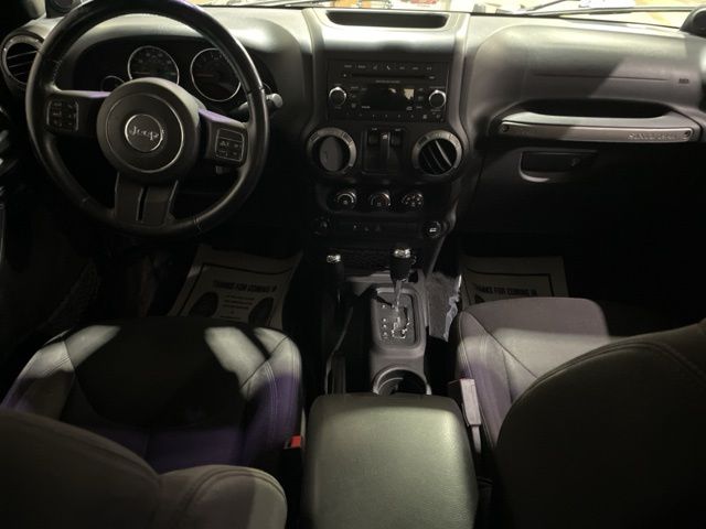 Used 2014 Jeep Wrangler Sport with VIN 1C4AJWAGXEL137758 for sale in Williston, ND
