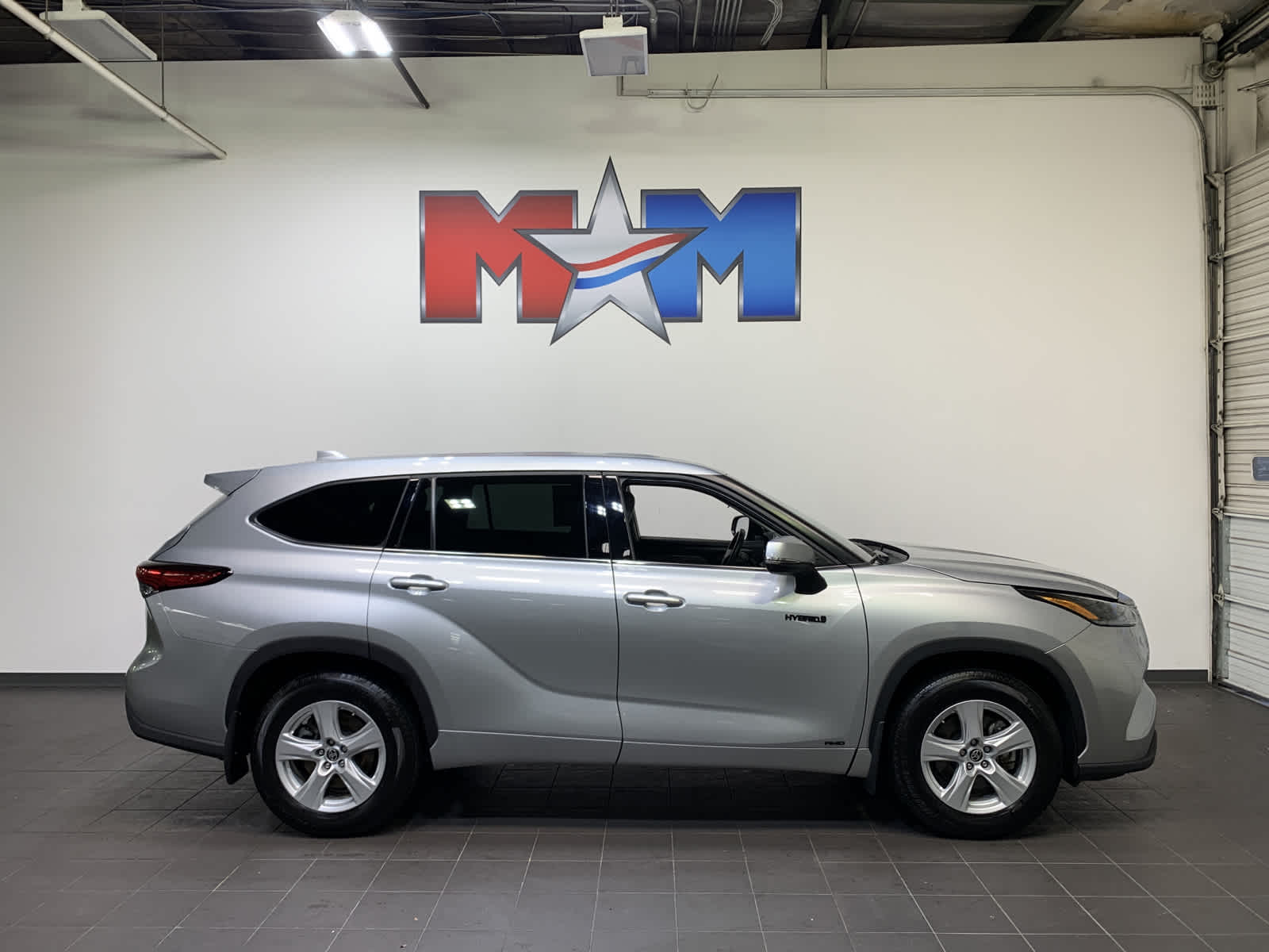 PreOwned 2021 Toyota Highlander Hybrid LE Sport Utility in