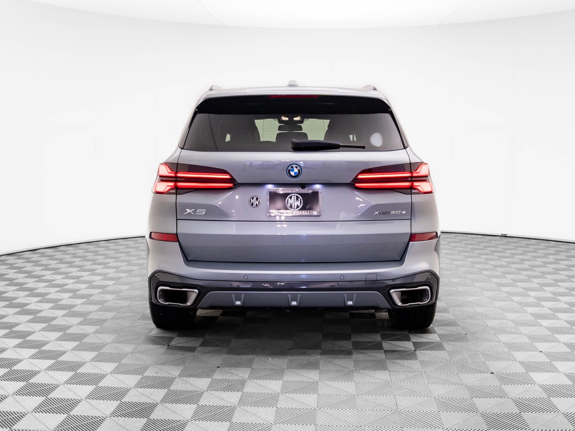 Certified Used 2024 Skyscraper Grey Metallic BMW xDrive50e image 4