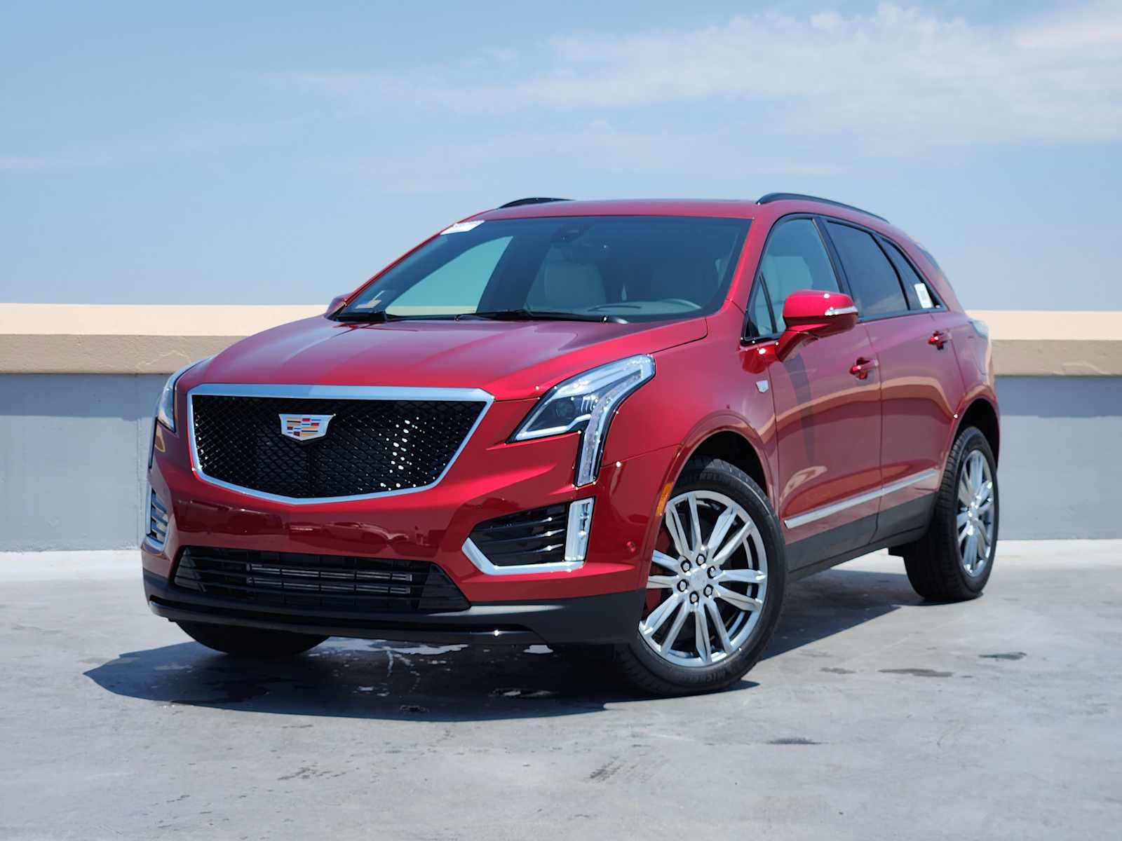 New 2025 Radiant Red Tintcoat Cadillac Sport image 1