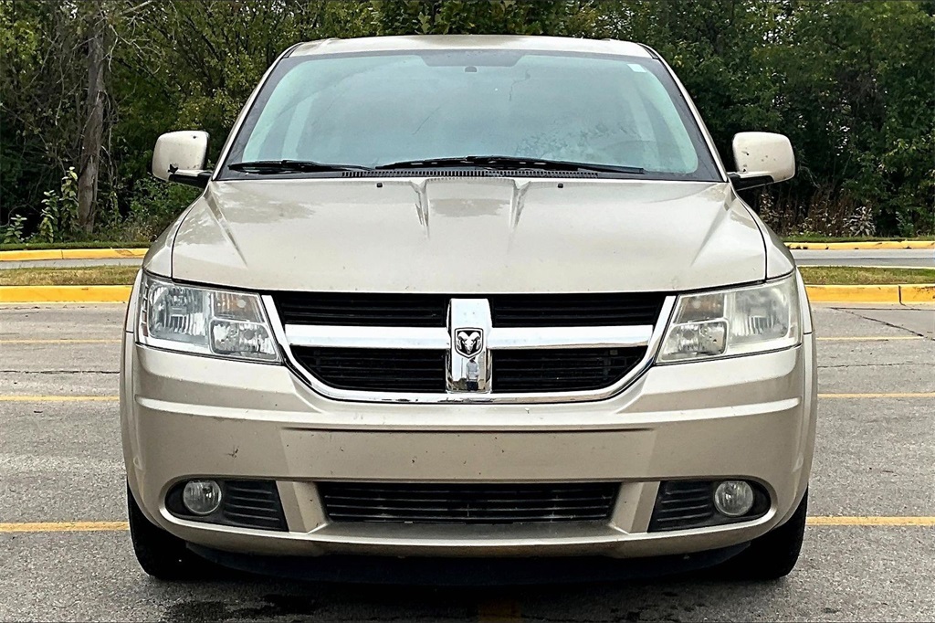 Used 2009 Dodge Journey SXT with VIN 3D4GH57V09T557967 for sale in Lawrence, KS