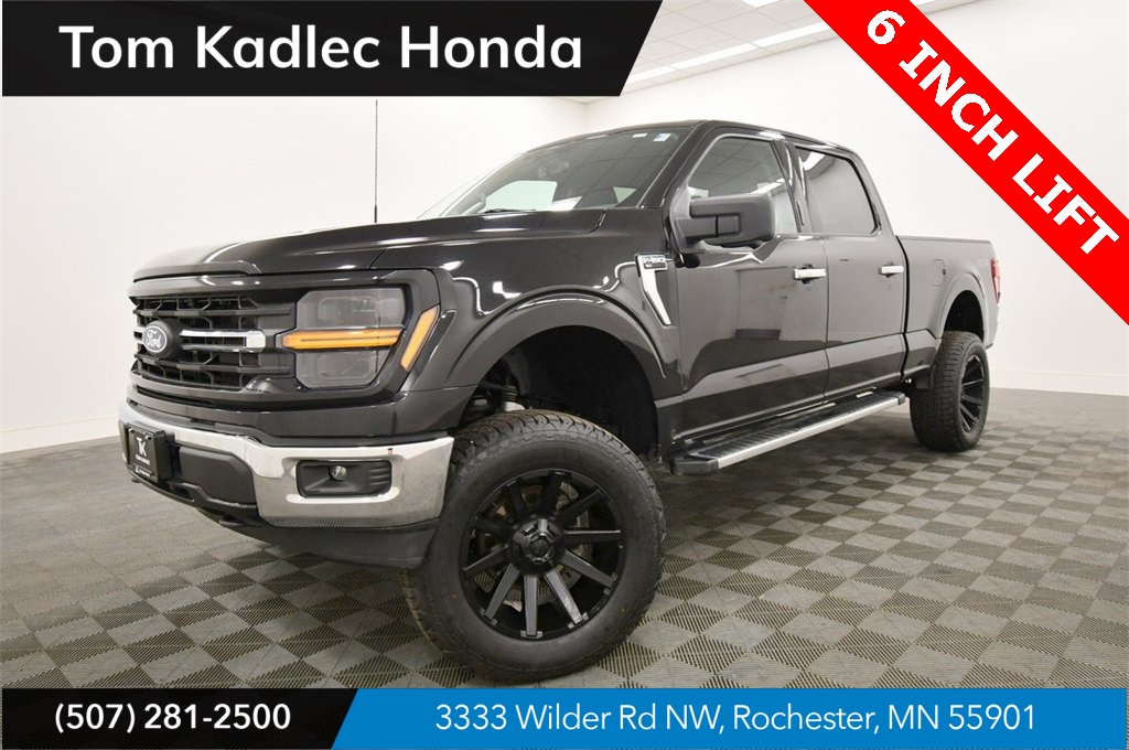 Used 2024 Agate Black Metallic Ford XLT image 1