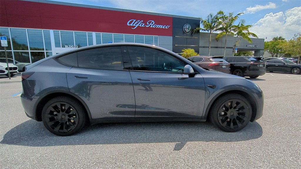 Used 2022 Tesla Model Y Long Range with VIN 7SAYGDEEXNA005970 for sale in Kansas City