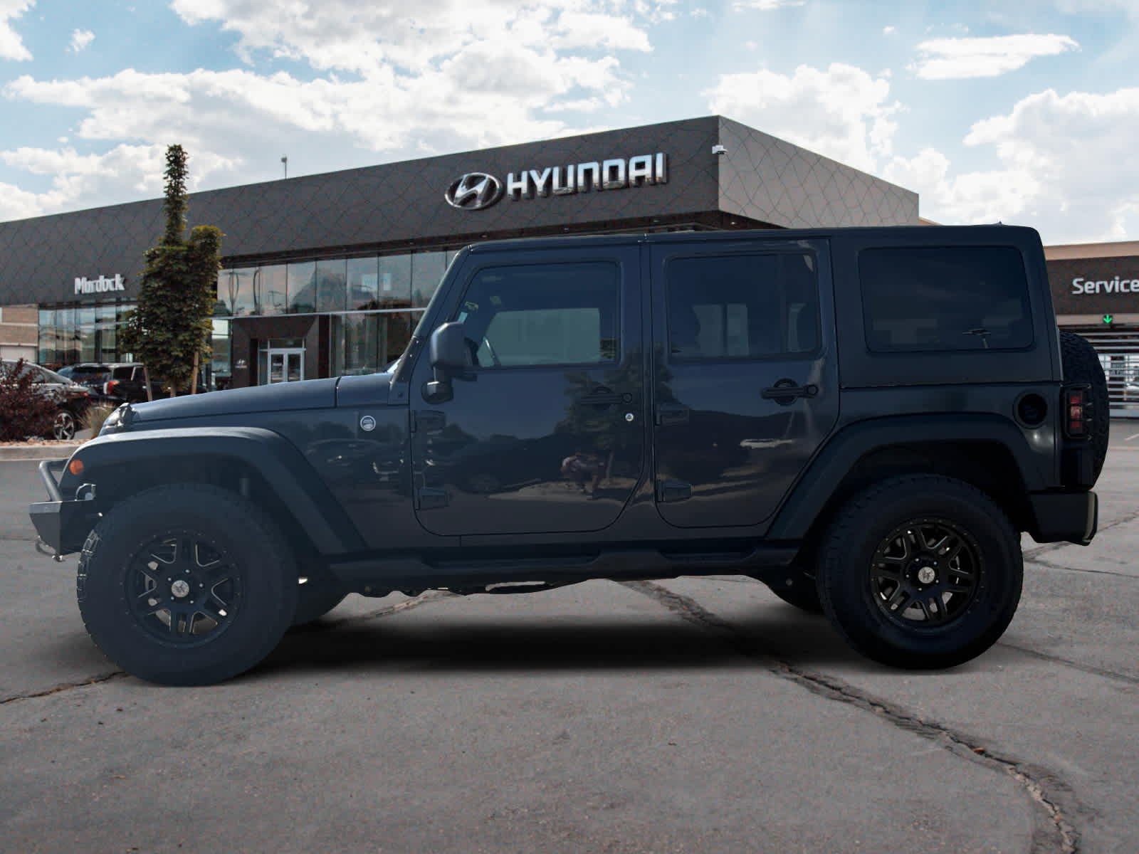 Used 2016 Jeep Wrangler Unlimited Sport S with VIN 1C4BJWDG7GL341338 for sale in Lindon, UT