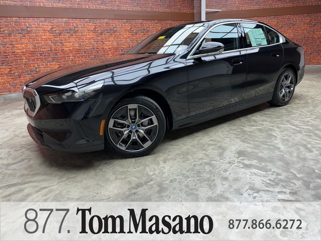 Used 2025 Black BMW xDrive40 image 1