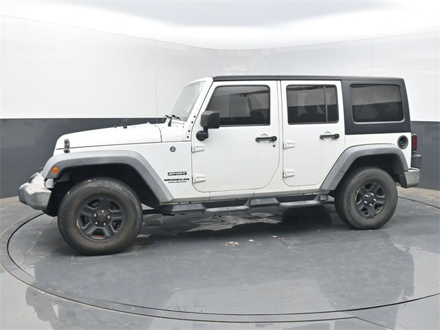 Used 2016 Jeep Wrangler Unlimited Sport with VIN 1C4BJWDG0GL144947 for sale in McAlester, OK
