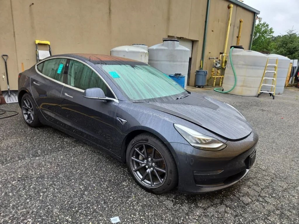 Used 2018 Tesla Model 3 Long Range Dual Motor with VIN 5YJ3E1EB8JF128357 for sale in Bedford, OH