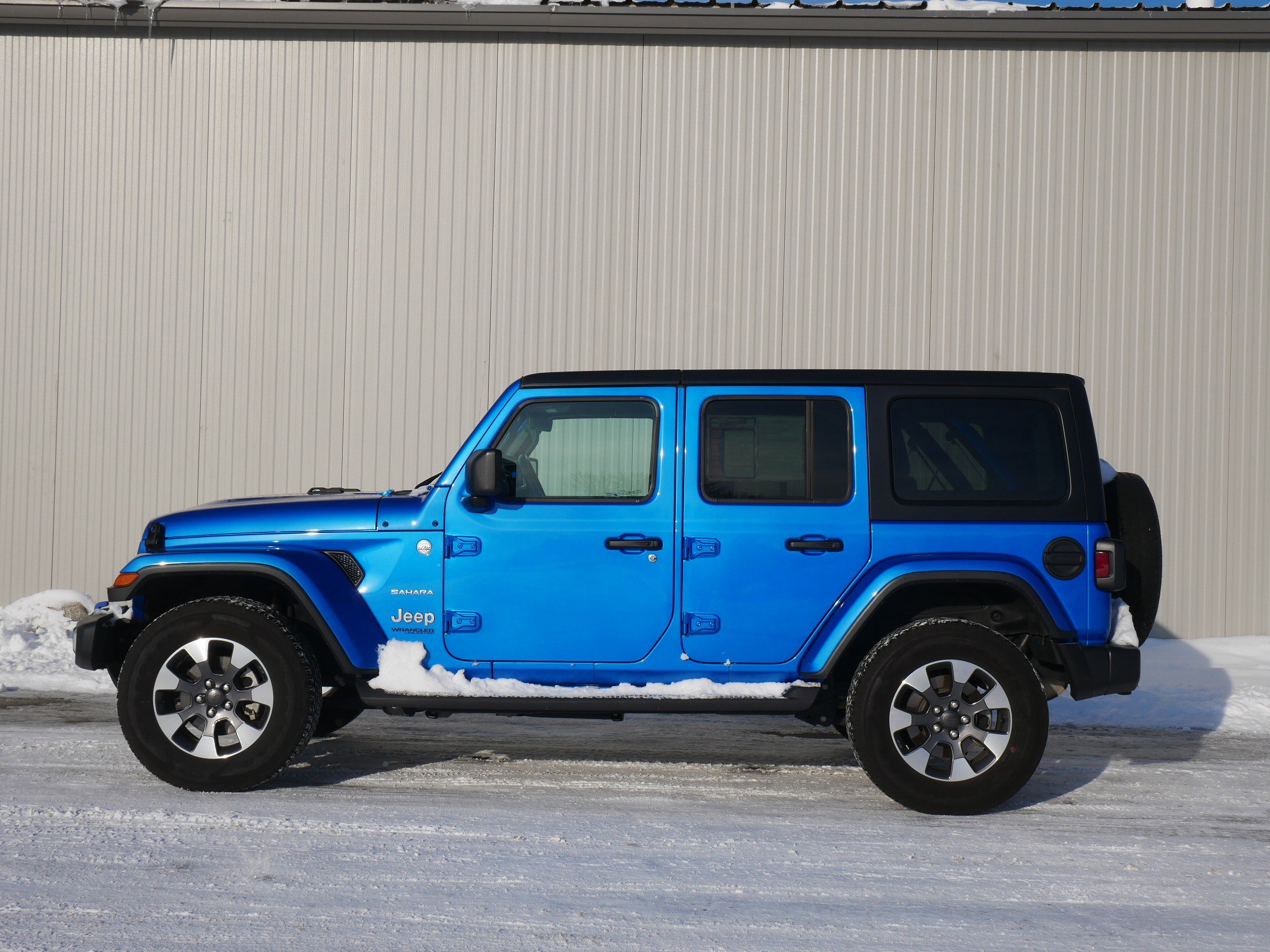 Used 2022 Jeep Wrangler Unlimited Sahara with VIN 1C4HJXEG9NW102755 for sale in Hastings, Minnesota