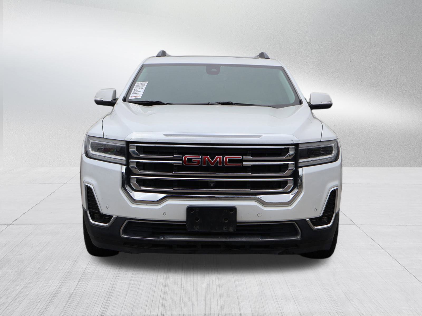 Used 2021 GMC Acadia SLT with VIN 1GKKNMLS9MZ108136 for sale in Kansas City