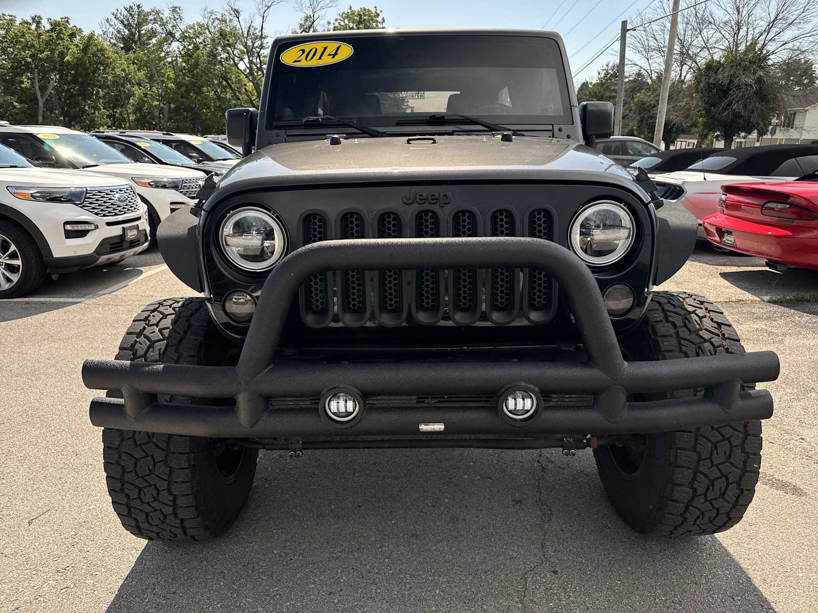 Used 2014 Jeep Wrangler Unlimited Sport with VIN 1C4BJWDG3EL287680 for sale in West Branch, IA