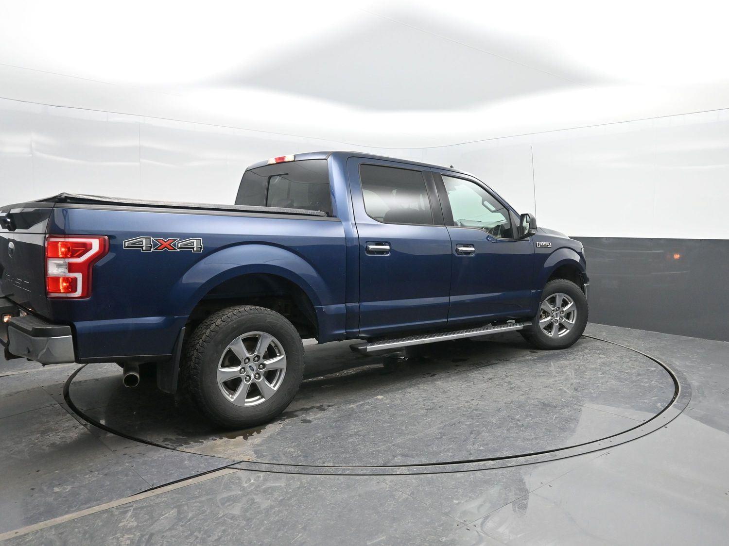 Used 2019 Ford F-150 XLT with VIN 1FTEW1E59KKE06865 for sale in Charles City, IA