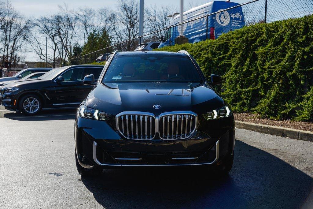 New 2025 Black Sapphire Metallic BMW xDrive50e image 3