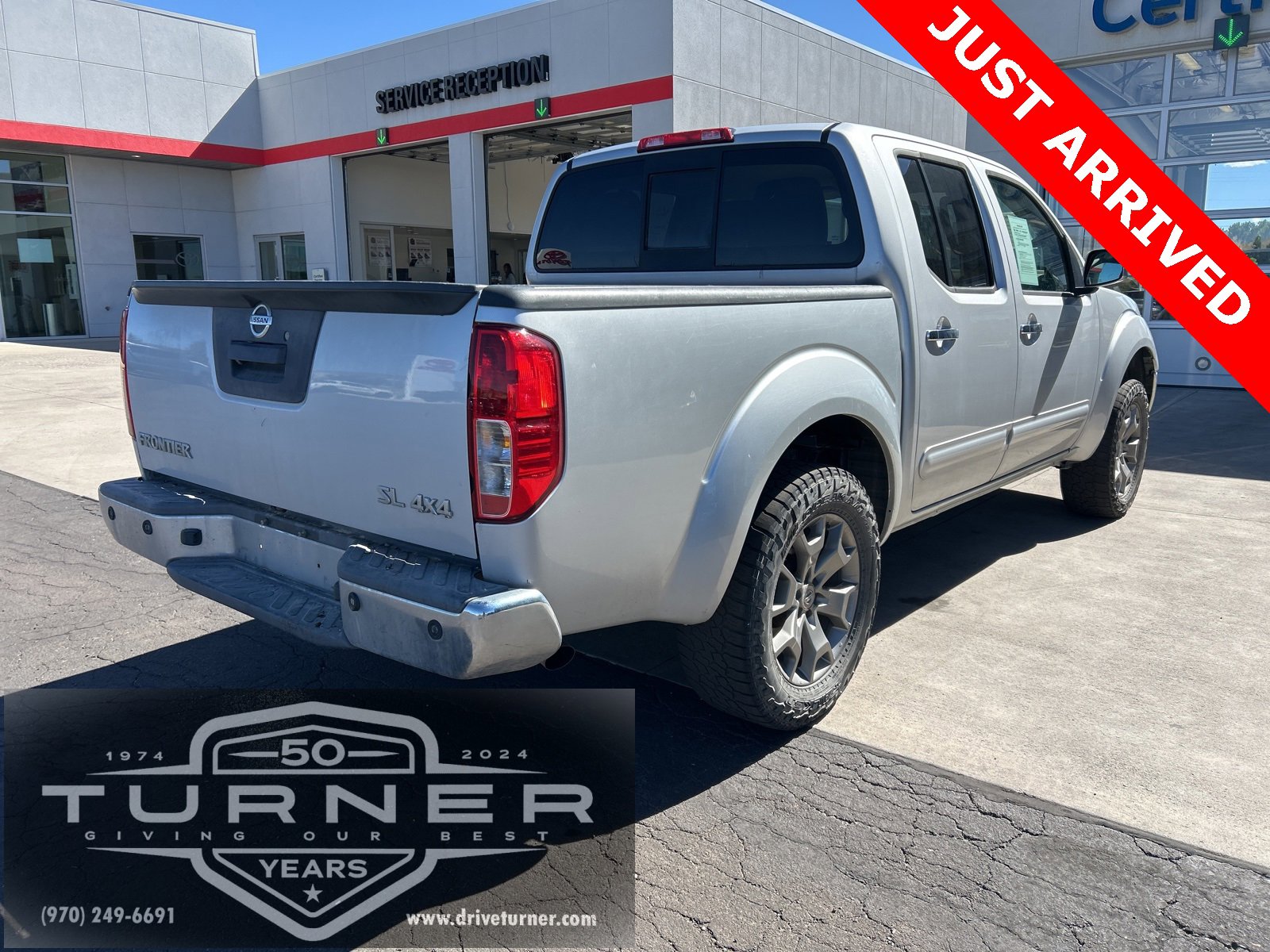 2014 Nissan Frontier SL photo 2