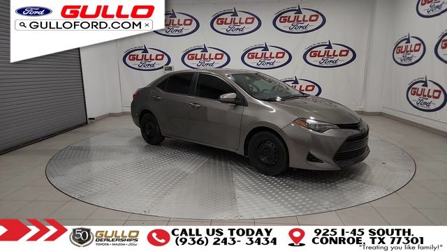 Used 2018 Toyota Corolla LE with VIN 5YFBURHE2JP819553 for sale in Conroe, TX