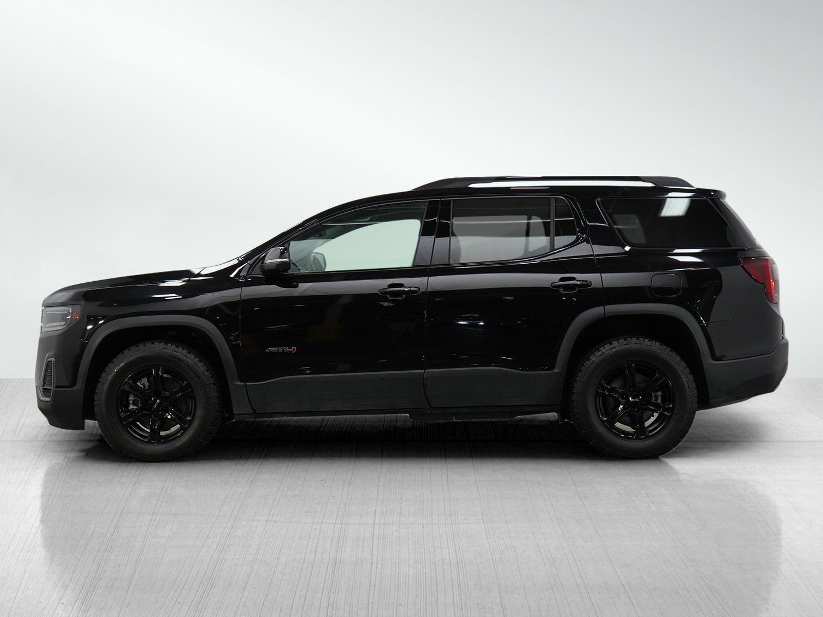 Used 2021 GMC Acadia AT4 with VIN 1GKKNLLS8MZ167317 for sale in Burnsville, Minnesota