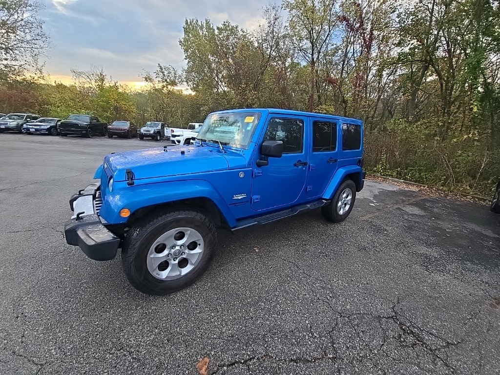 Used 2015 Jeep Wrangler Unlimited Sahara with VIN 1C4BJWEG1FL645634 for sale in Kansas City