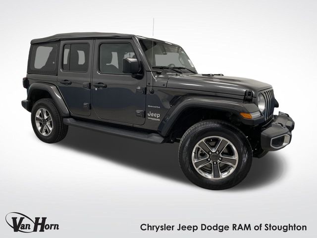 Used 2022 Granite Crystal Metallic Clearcoat Jeep Unlimited Sahara image 1