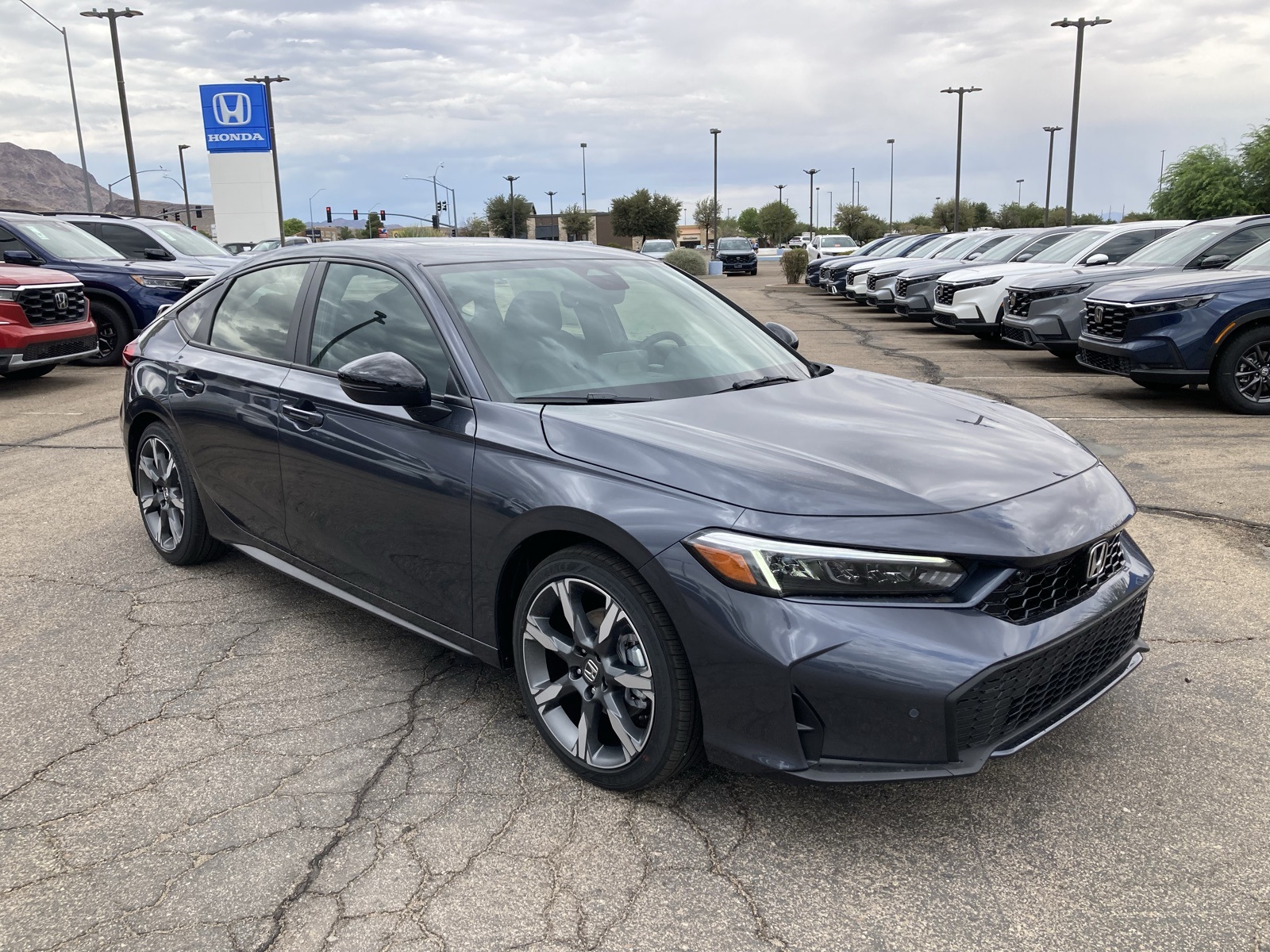 2026 Honda Civic Hatchback Sport Touring Hybrid photo 2