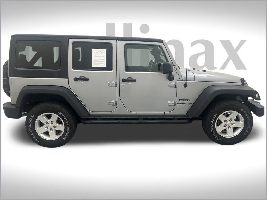 Used 2015 Jeep Wrangler Unlimited Sport with VIN 1C4BJWDG0FL672146 for sale in Kissimmee, FL