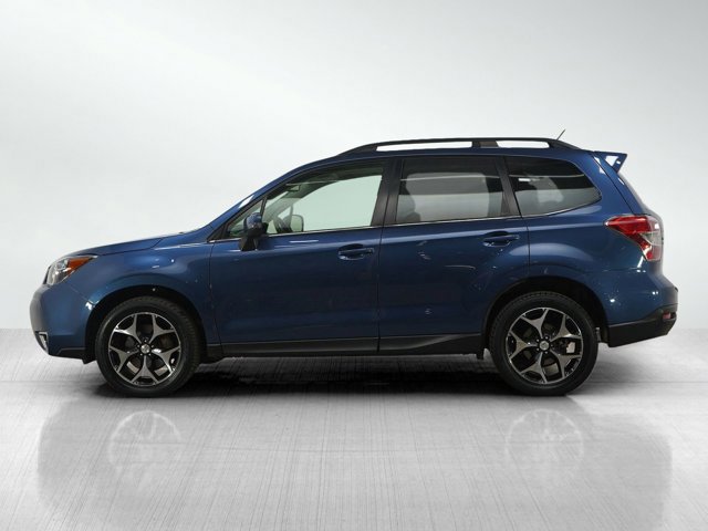 Used 2014 Subaru Forester XT Touring with VIN JF2SJGMC7EH485556 for sale in Burnsville, Minnesota
