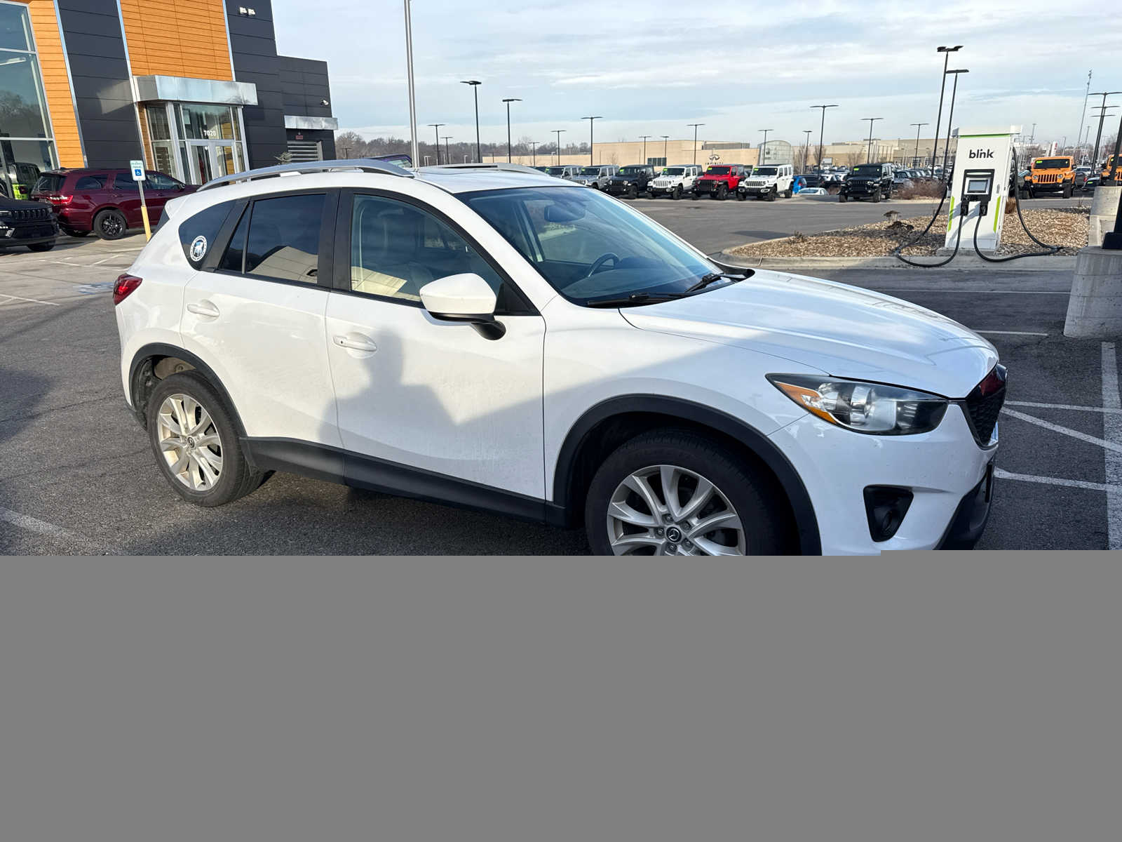 Used 2013 Mazda CX-5 Grand Touring with VIN JM3KE2DE5D0168807 for sale in Kansas City