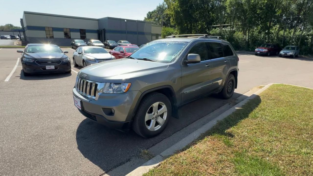 PreOwned 2011 Jeep Grand Cherokee LAREDO 4D SUV A255806 in Crystal