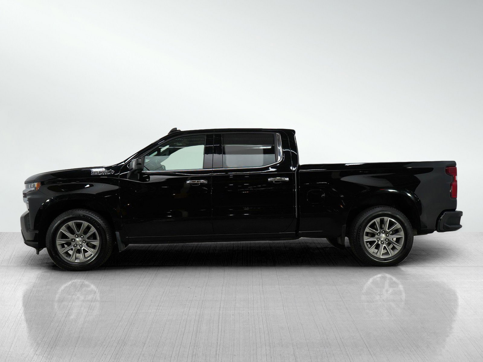 Used 2019 Chevrolet Silverado 1500 High Country with VIN 1GCUYHEL8KZ281054 for sale in White Bear Lake, Minnesota