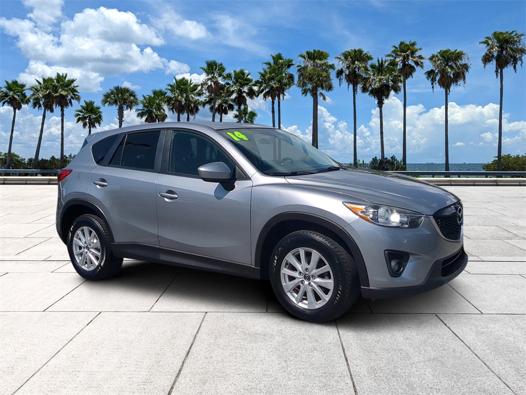 Used 2014 Mazda CX-5 Touring with VIN JM3KE2CY7E0338565 for sale in Tampa, FL