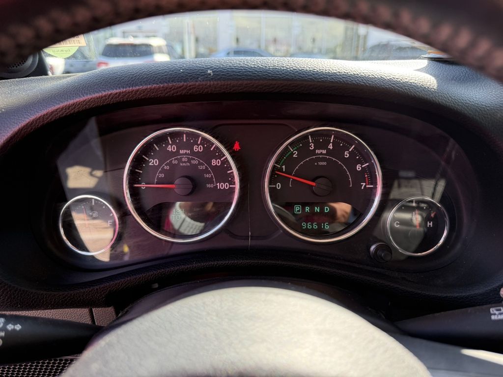 Used 2013 Blue Jeep Unlimited Sahara image 9