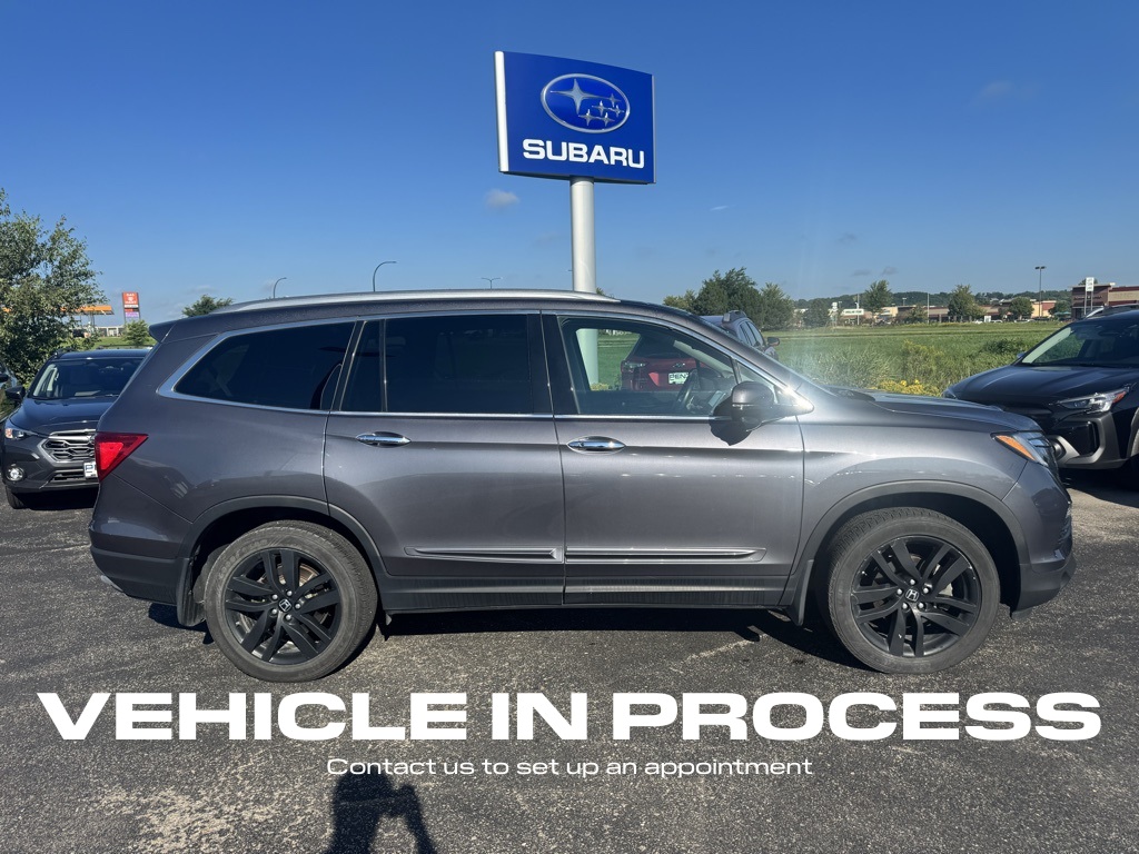 Used 2017 Honda Pilot Touring with VIN 5FNYF6H97HB066811 for sale in Rochester, Minnesota