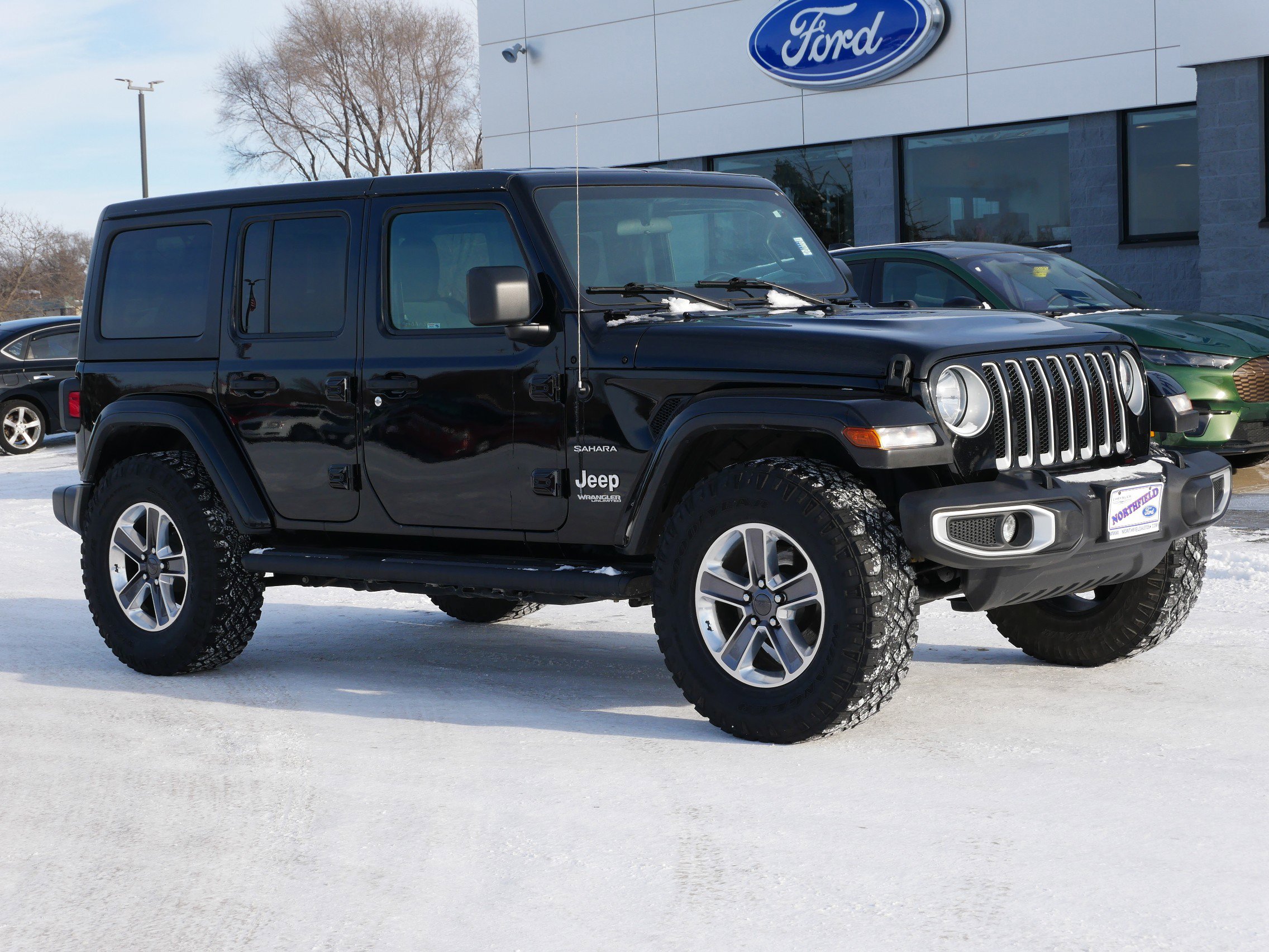 Used 2021 Jeep Wrangler Unlimited Sahara with VIN 1C4HJXEN8MW653739 for sale in Northfield, Minnesota
