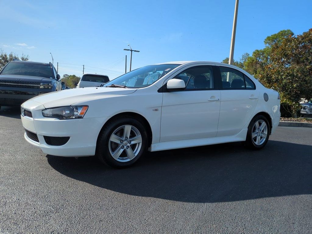 Used 2014 Mitsubishi Lancer SE with VIN JA32V2FW9EU014883 for sale in Bradenton, FL