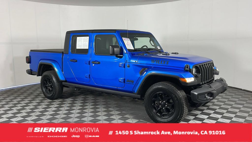 Used 2021 Blue Jeep Sport image 1