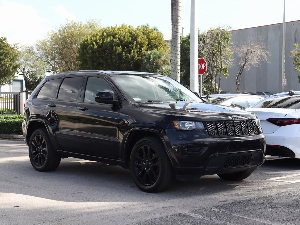 Used 2019 Jeep Grand Cherokee Altitude with VIN 1C4RJEAG6KC571619 for sale in Doral, FL