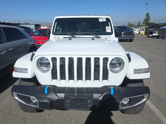 Used 2022 Jeep Wrangler Unlimited Sahara 4XE with VIN 1C4JJXP63NW266377 for sale in Kansas City