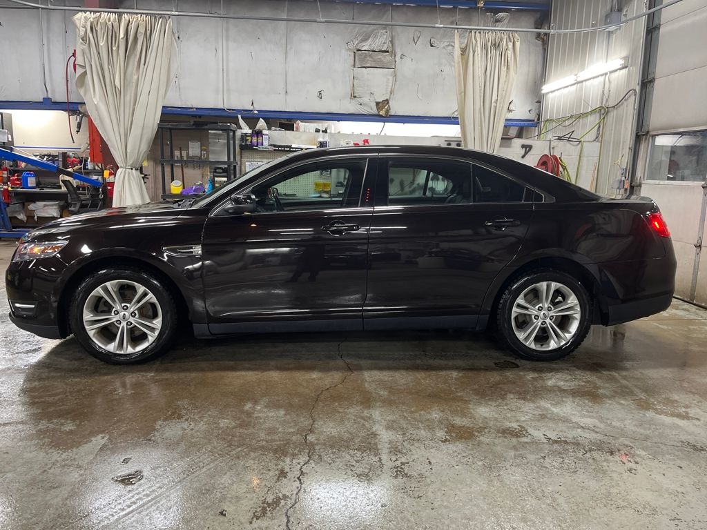 Used 2013 Ford Taurus SEL with VIN 1FAHP2E80DG221349 for sale in Northfield, Minnesota