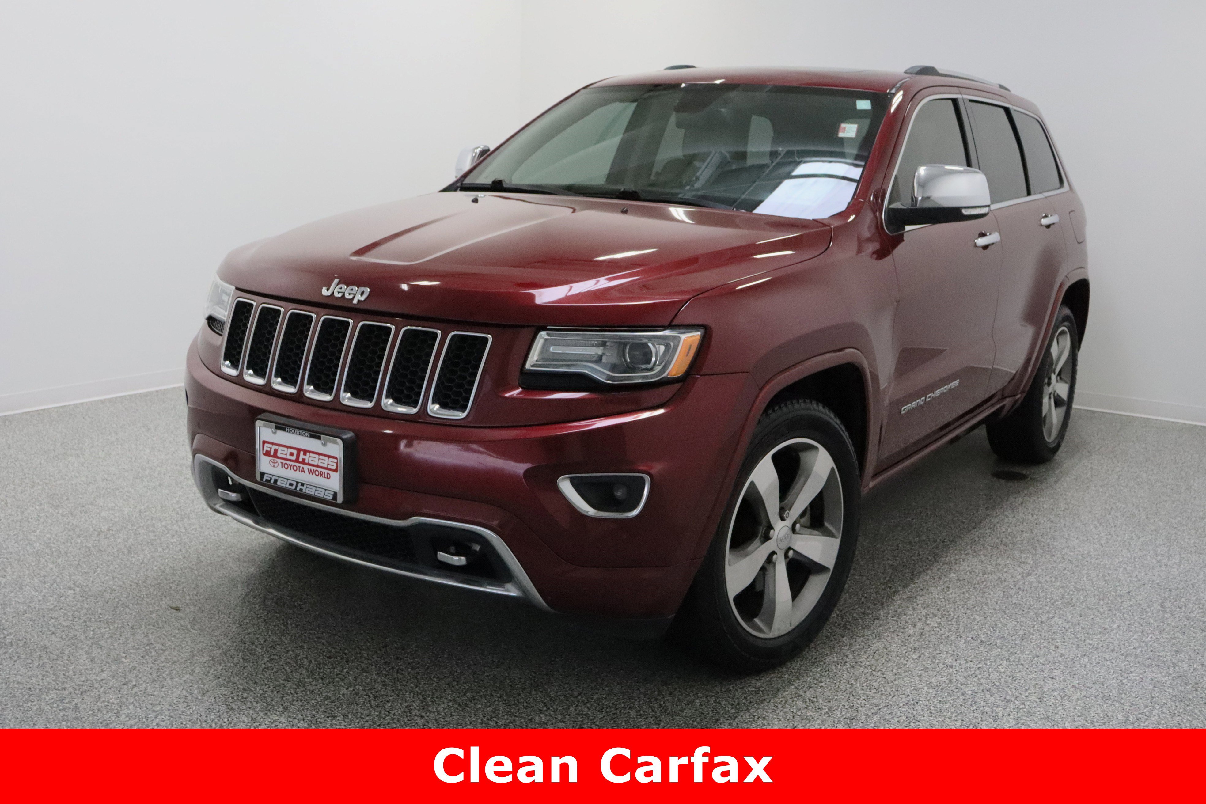 Used 2015 Jeep Grand Cherokee Overland with VIN 1C4RJECG8FC884917 for sale in Spring, TX