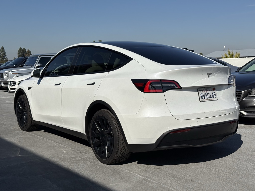 Used 2021 Tesla Model Y Standard Range with VIN 5YJYGDED9MF123305 for sale in Northfield, Minnesota