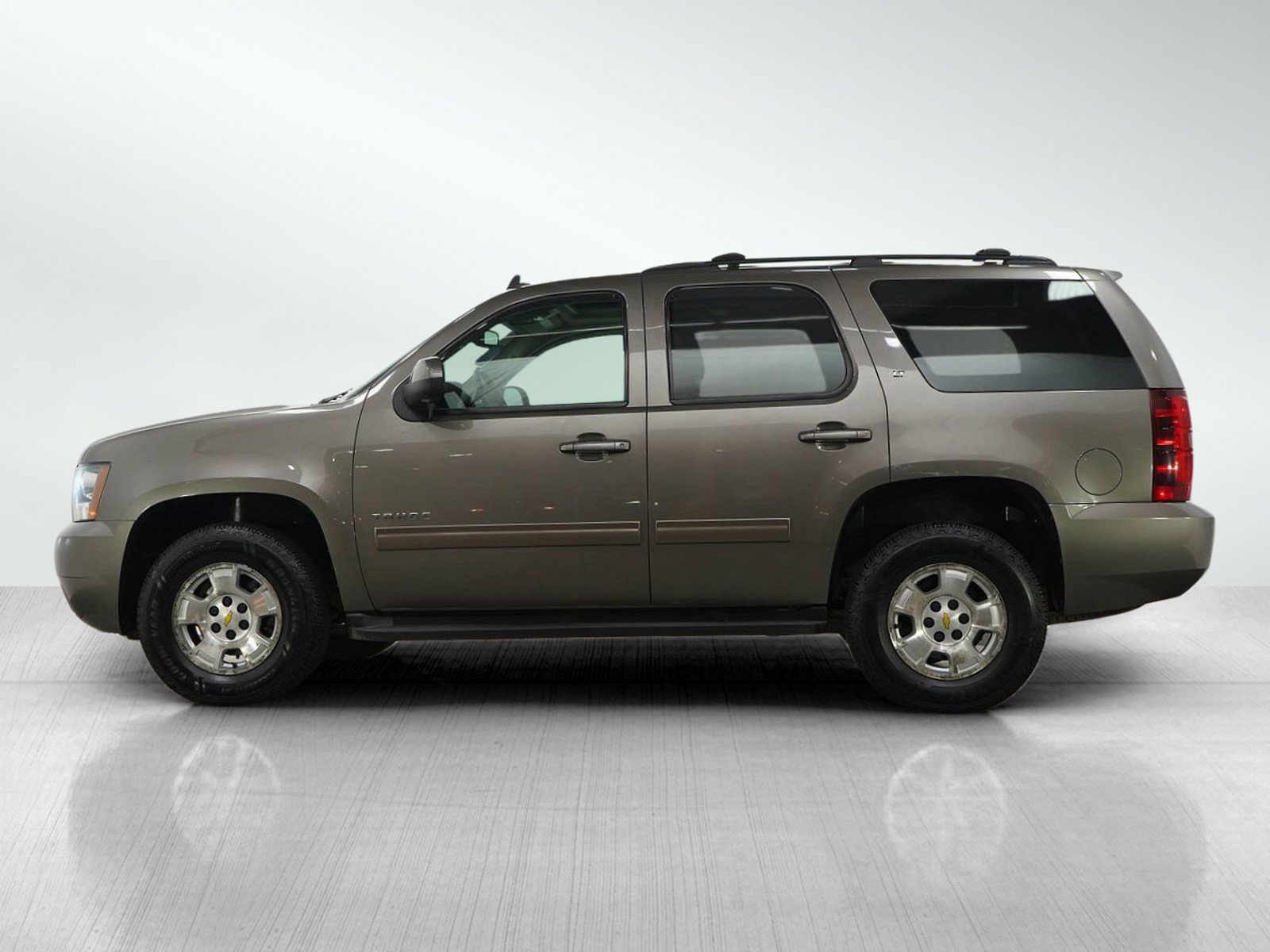 Used 2012 Chevrolet Tahoe LT with VIN 1GNSKBE03CR195297 for sale in Burnsville, Minnesota