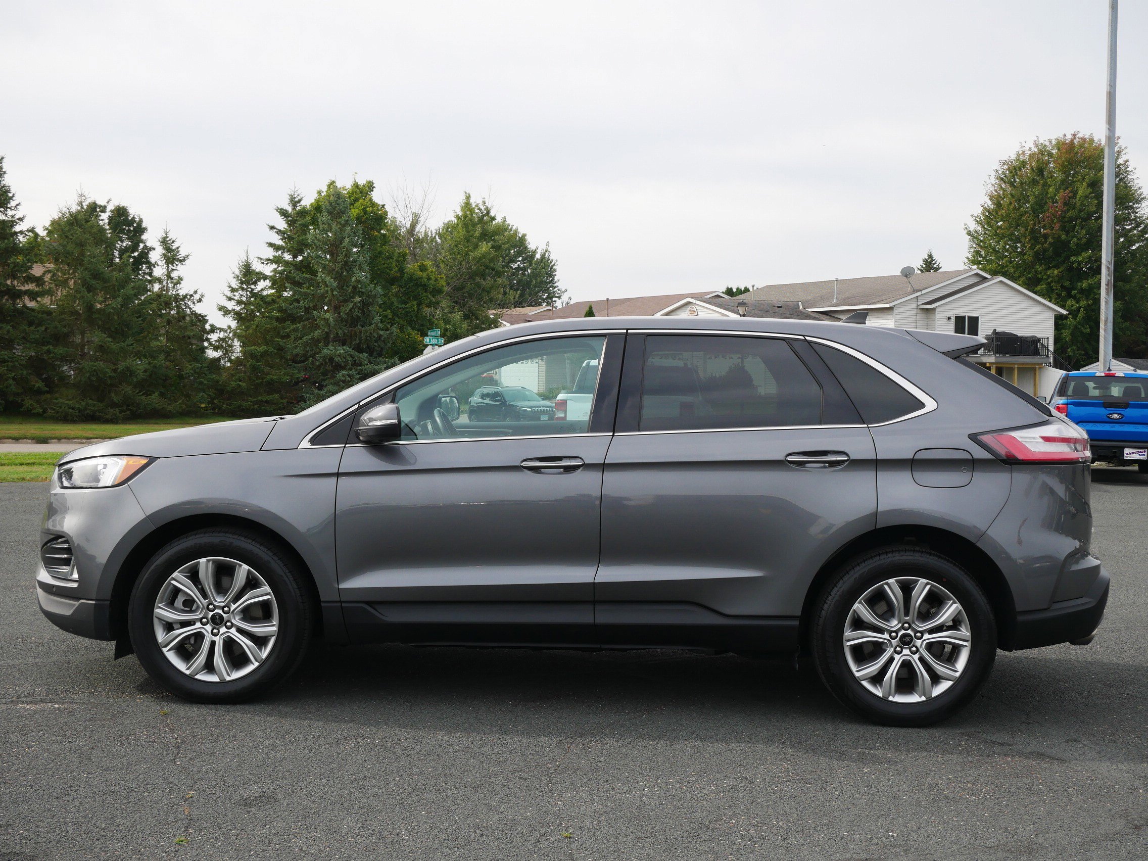 Used 2024 Ford Edge Titanium with VIN 2FMPK4K96RBA90077 for sale in Hastings, Minnesota
