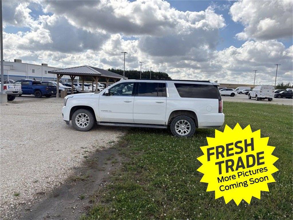 Used 2017 GMC Yukon XL SLT with VIN 1GKS2GKC2HR156636 for sale in Charles City, IA