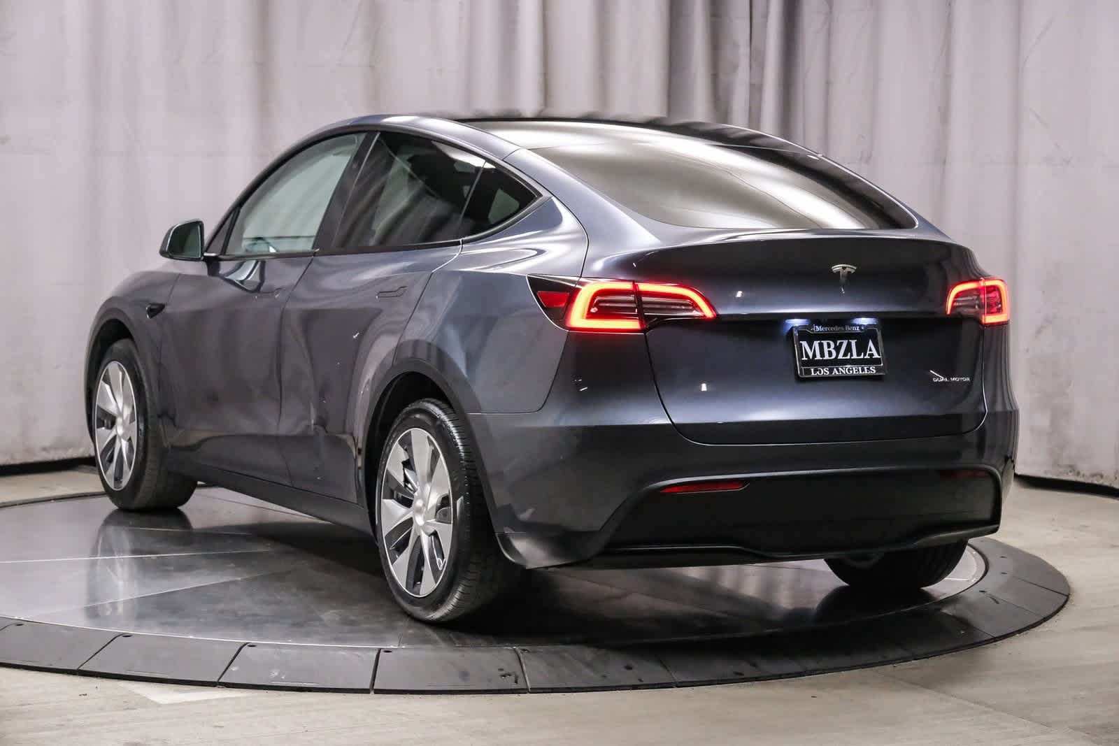 Used 2023 Tesla Model Y Long Range with VIN 7SAYGDEE6PF883675 for sale in Kansas City