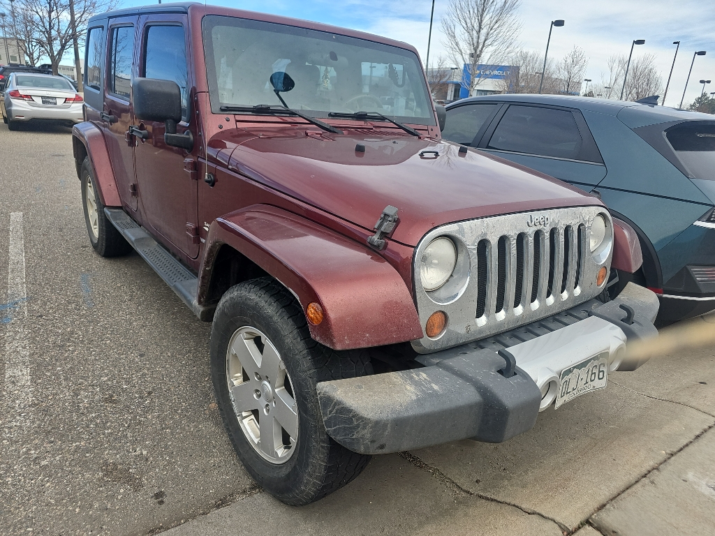Used 2010 Jeep Wrangler Unlimited Sahara with VIN 1J4BA5H10AL192935 for sale in Loveland, CO