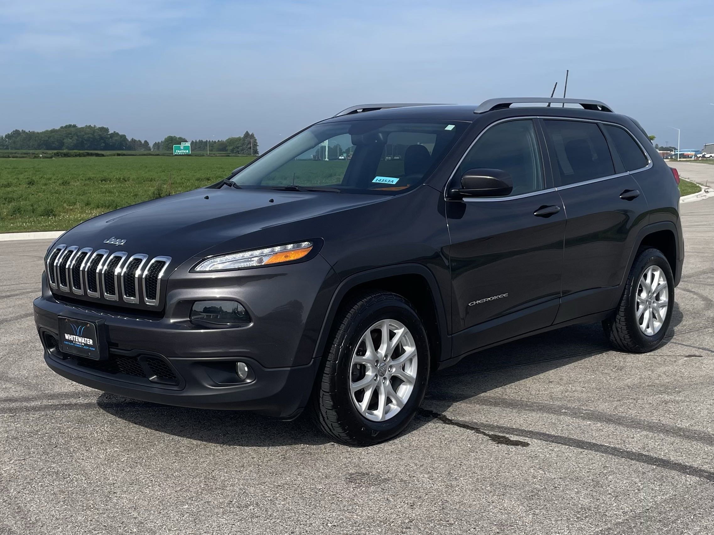 Used 2014 Jeep Cherokee Latitude with VIN 1C4PJMCS4EW297729 for sale in Saint Charles, Minnesota