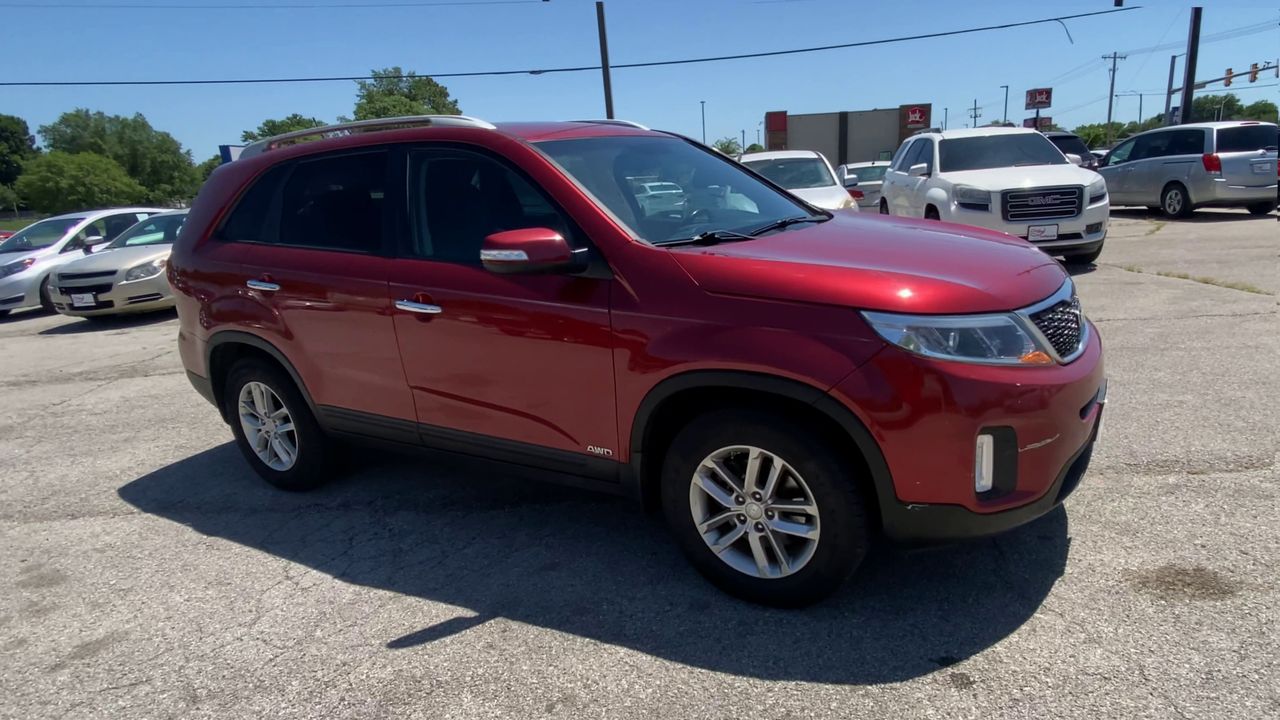 Used 2015 Red Kia LX V6 AWD image 1