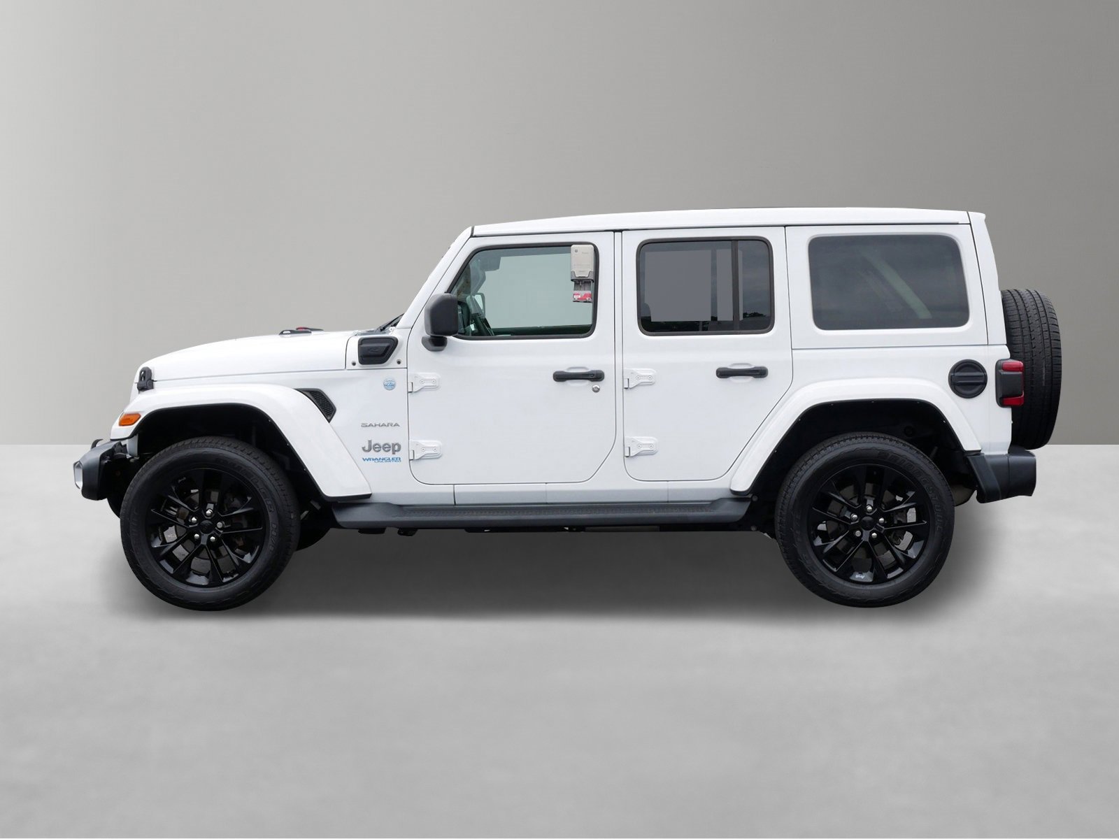 Used 2021 Jeep Wrangler Unlimited Sahara 4XE with VIN 1C4JJXP61MW802483 for sale in White Bear Lake, Minnesota